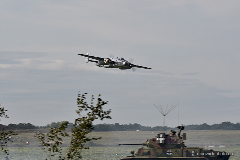 _DPI9494 copy.jpg - North American B-25D Mitchell "Yankee Warrior" C/N 43-3634 N3774 over battle field.