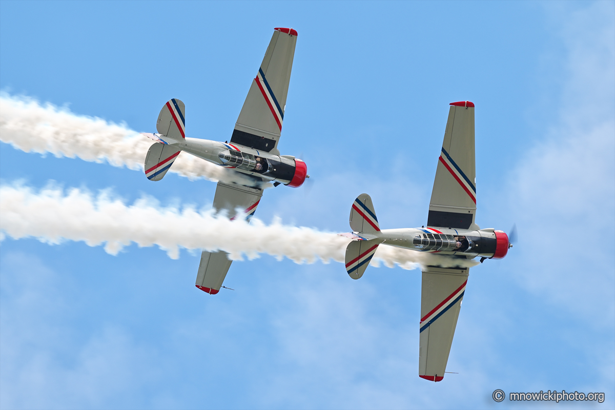 MN6_3943 copy.jpg - Warbird Thunder Airshow,  a two aircraft (SNJ/T-6 Texan) precision aerobatic formation   (2)